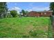 Expansive backyard featuring a playset, ideal for Gathering fun and entertainment at 1609 Troy Rd, Shelby, NC 28150