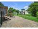 Spacious backyard features a stone patio and a fun playset, perfect for outdoor entertainment and recreation at 1609 Troy Rd, Shelby, NC 28150