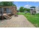 Spacious backyard with a play structure and patio, perfect for outdoor activities at 1609 Troy Rd, Shelby, NC 28150