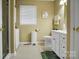 Clean bathroom with white cabinets, shower, and plenty of natural light at 1609 Troy Rd, Shelby, NC 28150