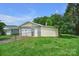 Detached garage with ample storage space, set in a well-maintained backyard at 1609 Troy Rd, Shelby, NC 28150