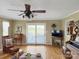 Relaxing living room with hardwood floors and access to an outdoor deck at 1609 Troy Rd, Shelby, NC 28150
