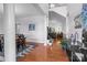 Spacious foyer featuring hardwood floors, elegant columns, and an open staircase at 161 Dairy Farm Rd, Mooresville, NC 28115