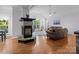 Inviting living room with a stone fireplace, hardwood floors, and comfortable seating at 161 Dairy Farm Rd, Mooresville, NC 28115