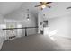 Large loft area with neutral carpet and plenty of natural light at 161 Dairy Farm Rd, Mooresville, NC 28115