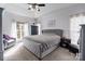 Primary bedroom with vaulted ceiling, sitting area, and lots of natural light at 161 Dairy Farm Rd, Mooresville, NC 28115