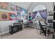 Study featuring a large arched window, a built-in desk, and artwork at 161 Dairy Farm Rd, Mooresville, NC 28115