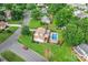 Aerial view of the home with a large backyard, swimming pool, and gazebo at 1724 Windy Rush Ln, Gastonia, NC 28054