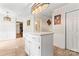 Bright kitchen with marble countertop island, stylish tile flooring, and updated lighting fixtures at 1724 Windy Rush Ln, Gastonia, NC 28054