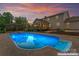 Backyard with a sparkling pool, a charming gazebo, and a lovely outdoor patio at 1724 Windy Rush Ln, Gastonia, NC 28054