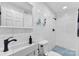 Bathroom featuring modern tiling, a sleek sink, and a walk-in shower with contemporary fixtures at 1822 N New Hope Rd, Gastonia, NC 28054