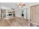 Inviting living room with a decorative fireplace, wood-look flooring, and lots of natural light at 1822 N New Hope Rd, Gastonia, NC 28054