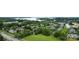 An aerial view of the neighborhood, showcasing lush green trees, bodies of water, and well-maintained lawns at 18460 W Catawba Ave, Cornelius, NC 28031