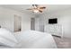 Cozy bedroom with an ensuite bathroom and a white dresser at 18460 W Catawba Ave, Cornelius, NC 28031