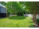 Expansive backyard featuring a lush lawn and well-maintained landscaping at 189 Mills Ln, Fort Mill, SC 29708