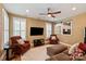 Cozy bonus room with comfortable seating, a large screen TV, and natural light from windows at 189 Mills Ln, Fort Mill, SC 29708