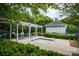 Community hot tub with pergola and lots of chairs, surrounded by greenery at 189 Mills Ln, Fort Mill, SC 29708