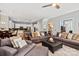 Spacious open living area flows into eat in kitchen with hardwood floors, and comfortable seating at 189 Mills Ln, Fort Mill, SC 29708