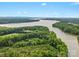 Breathtaking aerial view of land and winding river, surrounded by lush greenery at 195 Bluebird Ln, Salisbury, NC 28146