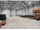Spacious garage with metal framework, concrete flooring and roll up doors at 195 Bluebird Ln, Salisbury, NC 28146