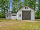 Large garage with multiple access points and varying construction styles at 195 Bluebird Ln, Salisbury, NC 28146