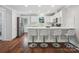 Modern kitchen with stainless steel appliances, a central island, and white cabinets offer a clean design at 195 Bluebird Ln, Salisbury, NC 28146