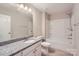 Bathroom features granite counters, a tub-shower combo, and neutral decor at 19812 Elise Caroline Aly, Davidson, NC 28036