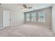 Bedroom with plush carpet, ceiling fan and plenty of natural light at 19812 Elise Caroline Aly, Davidson, NC 28036