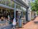 Charming bookstore with a window display and sidewalk advertising at 19812 Elise Caroline Aly, Davidson, NC 28036
