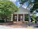 Classical brick library building with white columns and manicured landscaping for a serene environment at 19812 Elise Caroline Aly, Davidson, NC 28036