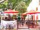 Vibrant restaurant patio featuring festive decor, outdoor seating, and a lively atmosphere at 19812 Elise Caroline Aly, Davidson, NC 28036