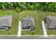 Aerial view of a property showcasing the roof, driveway, and well-maintained landscaping at 2185 Loire Valley Dr, Fort Mill, SC 29707