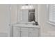 Well-lit bathroom featuring a vanity with a marble countertop, and modern lighting at 2185 Loire Valley Dr, Fort Mill, SC 29707