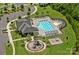 Community pool, playground, and pergola with seating at 2185 Loire Valley Dr, Fort Mill, SC 29707
