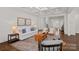 Bright living room boasts coffered ceilings, fireplace, and stylish decor at 2185 Loire Valley Dr, Fort Mill, SC 29707