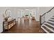 View from foyer into bright living room boasts coffered ceilings, fireplace, and stylish decor at 2185 Loire Valley Dr, Fort Mill, SC 29707