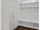 A functional mudroom featuring a built-in bench with storage and hooks at 2185 Loire Valley Dr, Fort Mill, SC 29707