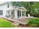 Inviting backyard patio with dining and lounge seating, perfect for outdoor entertaining at 2315 Lanesboro Rd, Marshville, NC 28103