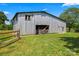 Spacious barn with metal exterior and wooden details, set on a grassy field at 2315 Lanesboro Rd, Marshville, NC 28103