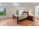 Spacious bedroom with hardwood floors, and two bright windows for natural light at 2315 Lanesboro Rd, Marshville, NC 28103