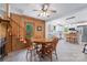 Inviting dining area with a wood table next to the remodeled kitchen. Stairs to upper level are visible at 2315 Lanesboro Rd, Marshville, NC 28103
