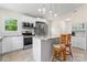 Modern kitchen featuring white cabinets, granite countertops, and stainless steel appliances at 2315 Lanesboro Rd, Marshville, NC 28103