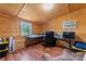 Functional office space with wood paneled walls, a desk, and an AC unit at 2315 Lanesboro Rd, Marshville, NC 28103