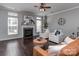 Cozy living room with a fireplace, stylish decor, and comfortable seating arrangement at 2331 Whitford Ln, Charlotte, NC 28210