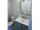 Bathroom with vanity, toilet and tiled mirror at 256 Lincoln Sw St # 1, Concord, NC 28025