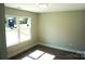 Bright bedroom with a large window and wood-look floors at 256 Lincoln Sw St # 1, Concord, NC 28025