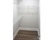 Walk-in closet with custom shelving and hardwood flooring at 256 Lincoln Sw St # 1, Concord, NC 28025