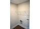 A laundry room with washer and dryer hookups, and shelving at 256 Lincoln Sw St # 1, Concord, NC 28025