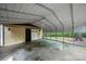 A spacious detached garage with a carport offers ample parking and storage at 3000 Low Gap Rd, Waxhaw, NC 28173