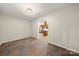 A room featuring view to a kitchen with stainless steel appliances and tiled floor at 3000 Low Gap Rd, Waxhaw, NC 28173